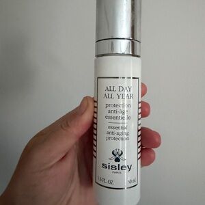 *Empty- Bottle only: Sisley All Day All Year White Bottle with Black Text